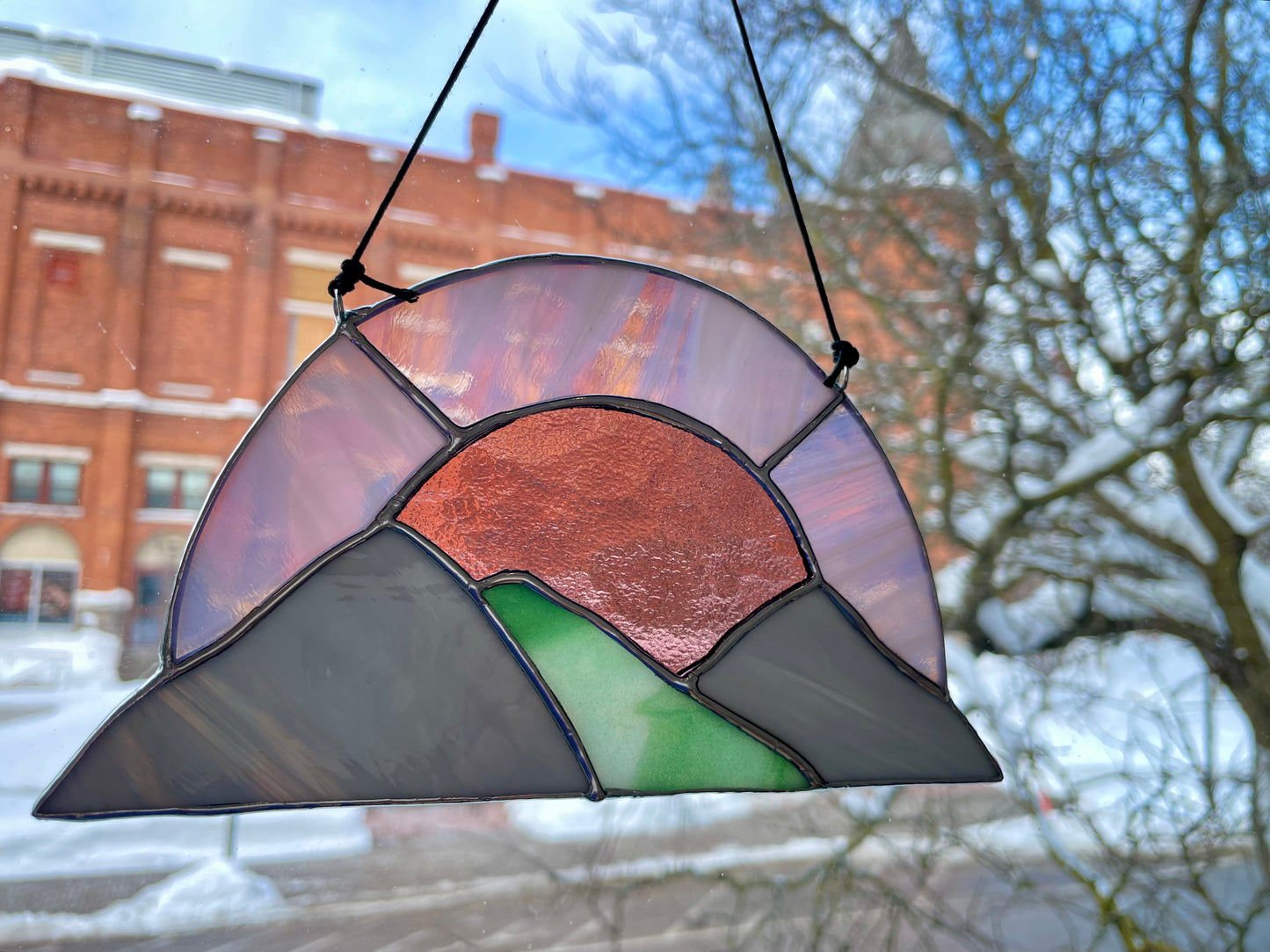 Stained Glass Sun Over the Mountains